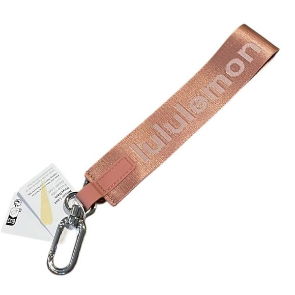 Lululemon never lost key chain deco pink/light ivory - Picture 1 of 4